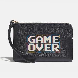 Coach “Game Over” Wristlet